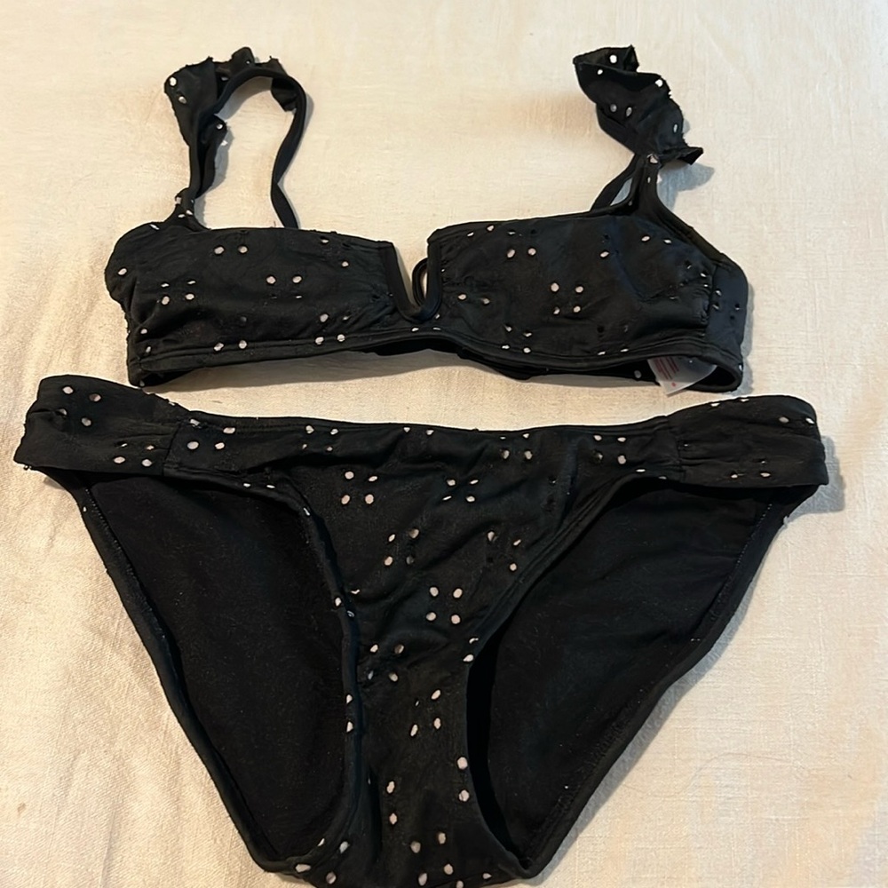 Black swimsuit, small top and medium bottoms